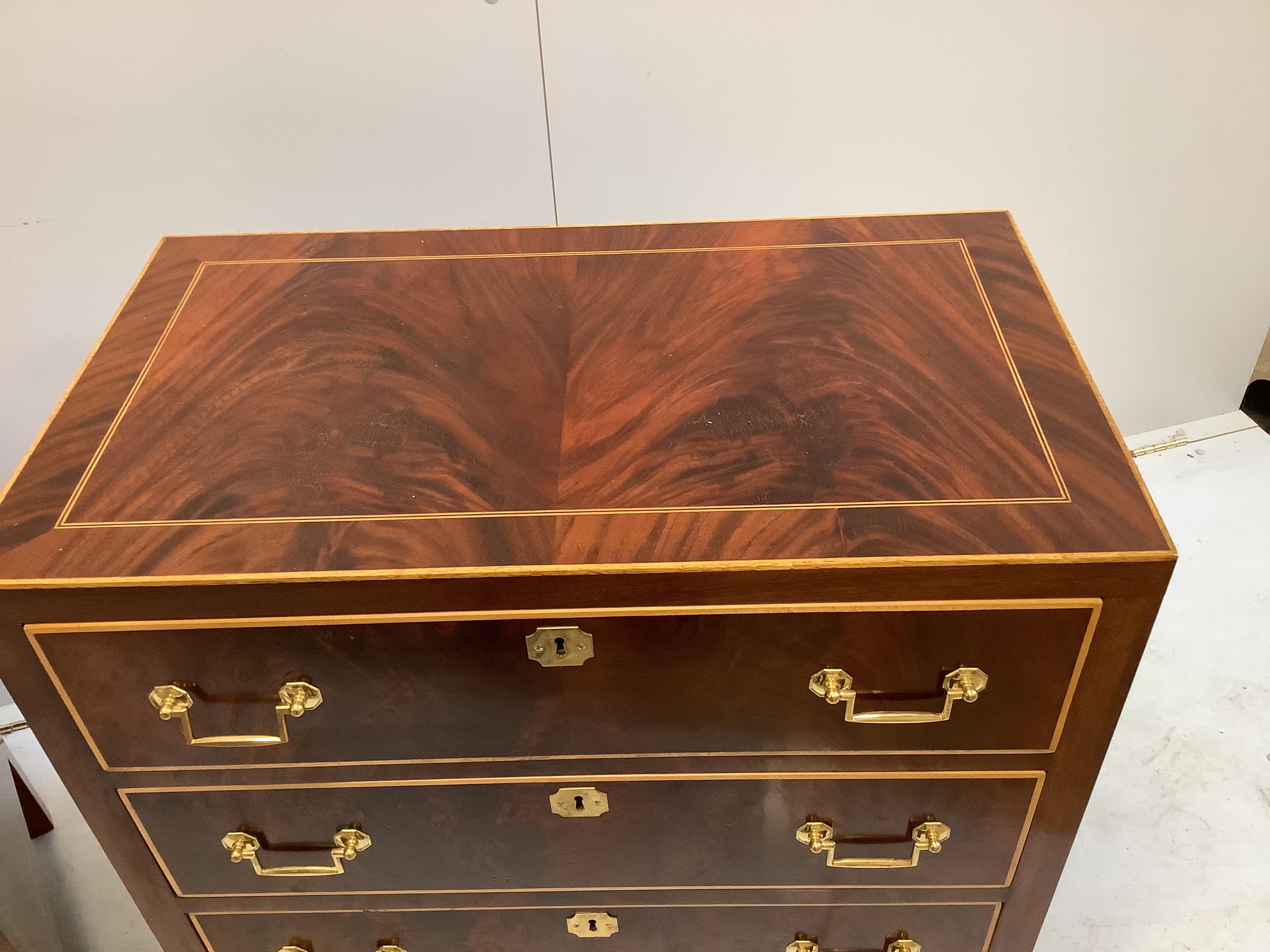 A pair of George IV style inlaid mahogany three drawer chests, width 79cm, depth 46cm, height 78cm